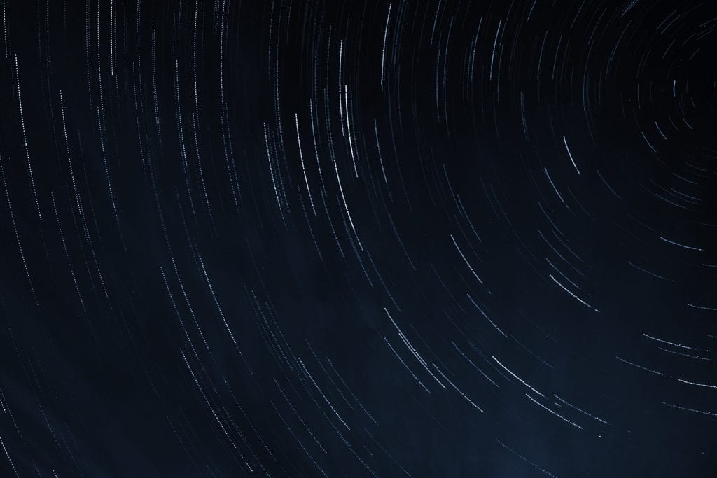 Space, time-lapse of stars spinning